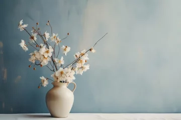 Foto op Aluminium Florero de cerámica con flores de loto, precioso jarrón de barro blanco para decorar la casa, interiorismo artesanal y decoración minimalista  © Loktor