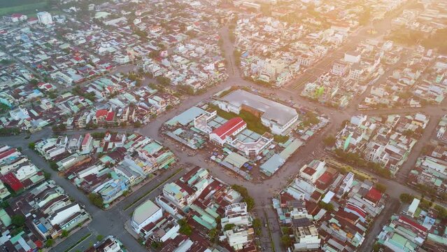 Aerial view of Long Hoa market, a famous market at Tay Ninh city, Vietnam, far away is Ba Den mountain in the morning