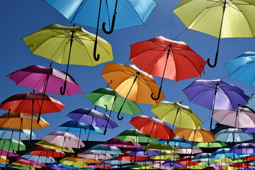 Fototapeta na wymiar Canopy of colorful parasols 