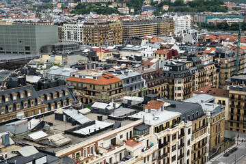 Obraz premium Birds eye view of rooftops in central San Sebastian