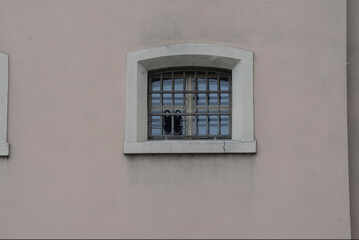a prison window with bars