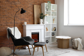 Interior of modern living room with stylish fireplace