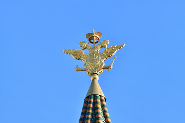 Double-headed eagle - coat of arms of the Russian Federation on the spire of Resurrection Gate in...