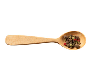New wooden spoon with mixture of dry round hot red pepper, black pepper, white pepper, green pepper isolated on white background