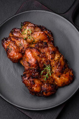 Delicious baked chicken meat with salt, spices and herbs