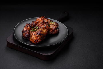 Delicious baked chicken meat with salt, spices and herbs