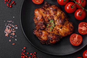 Delicious baked chicken meat with salt, spices and herbs