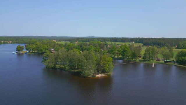 Perfect aerial top view flightdrone. Summer Paradise Wooded Island in Lake