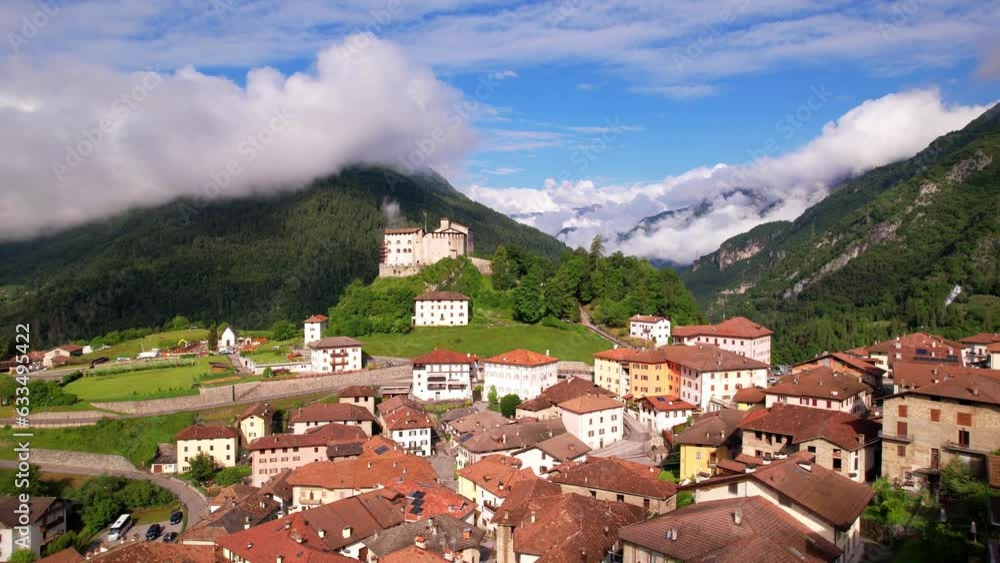 Wall mural medieval castles of northern Italy. Castle Stenico and picturesque village. Trentino region, province of Trento.
aerial drone overflight view