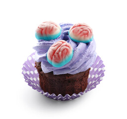 Delicious Halloween cupcake with candies on white background