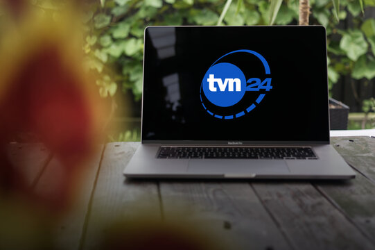 TVN24 logo, Polish 24-hour commercial news channel, a part of the TVN Network, displayed on a MacBook Pro screen