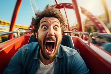 Foto auf Leinwand Shocked screaming man open mouth riding roller coaster. Generative AI. © Bargais
