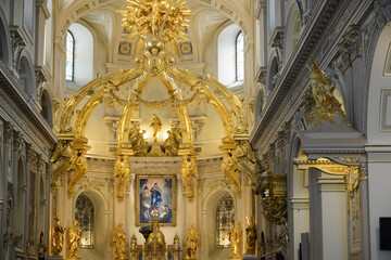with golden ornaments decorated interior of the Cathedral Notre Dame de Quebec in the old town of...
