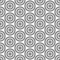 Repeated small and big black circles background. Seamless surface pattern design with circular ornament. Hoops wallpaper. Round motif. Spheres image. Digital paper with rings. Vintage style vector art