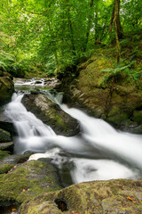 Long exposure of a waterfall on the East Lyn river at Watersmeet in Exmoor National Park