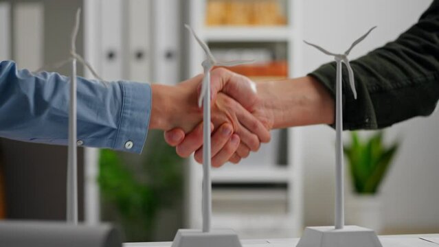 Negotiations, Colleagues at work Responsibly confirms the deal wind energy research center, Concept Businessman's assistant Confirms the deal robotization and autonomy, agreement