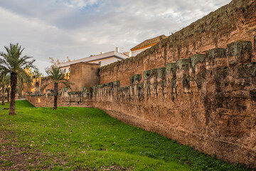 Ancient City Walls. Sevilla City Walls were first built by the Romans in the 1st century BC and then modified by others who conquered the city. Seville, Spain.