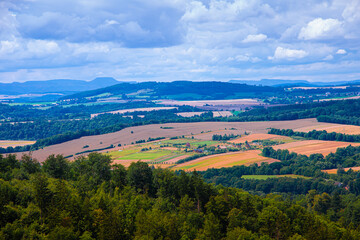 Fototapeta na wymiar Beautiful landscape of fields. View from the mountain to the rural fields. summer day.