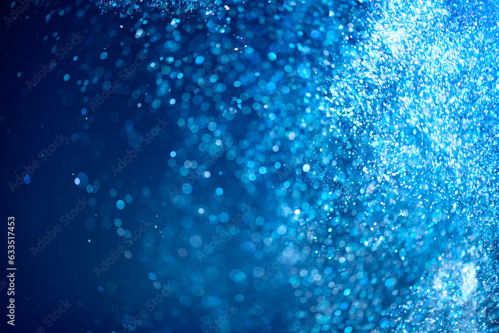 Wall mural abstract blue background with floating particles, glowing backdrop. glitter blinking sparks backgrou