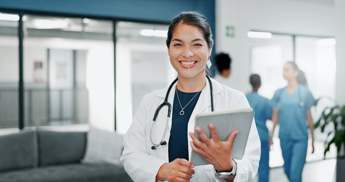 Happy woman or doctor face in busy hospital with tablet for healthcare services, leadership and career mindset. Portrait of medical professional or female on telehealth app for clinic job management