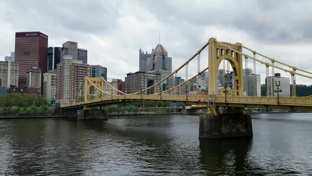 Drone view moving closer to the 7th Avenue Roberto Clemente bridge in Pittsburgh.