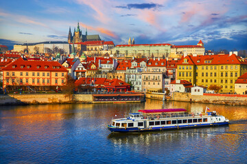 Old town of Prague, Czech Republic over river Vltava with Saint Vitus cathedral on skyline. Bright sunny day with blue sky. Praha panorama landscape view - 633524467