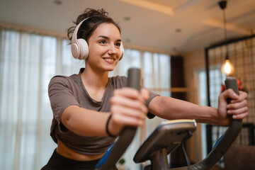 One woman young training on Indoor Cycling stationary Exercise Bike