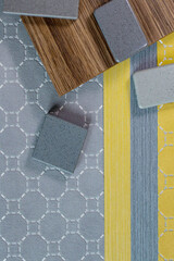 Close up combination of interior material containing set of artficial stone and wooden veneer...
