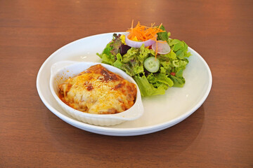Lasagna, an Italian dish made of stacked layers of lasagna alternating with fillings such as ground meats and tomato sauce, vegetables, cheeses and seasonings and spices. Selective focus