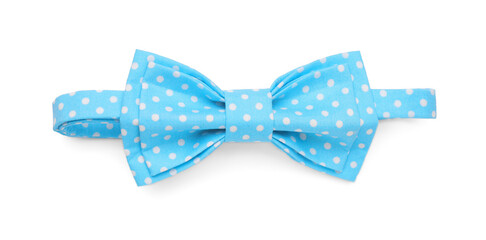 Stylish light blue bow tie with polka dot pattern on white background, top view
