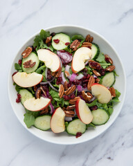 vegetable salad with apples and pecans