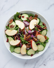 vegetable salad with apples and pecans