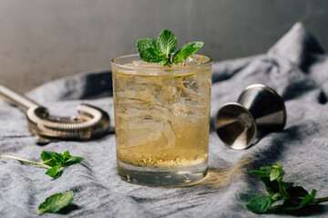 Whiskey Smash Cocktail booze bourbon whiskey, fresh lemon juice, syrup and mint leaves