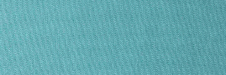 Light blue textile as background.