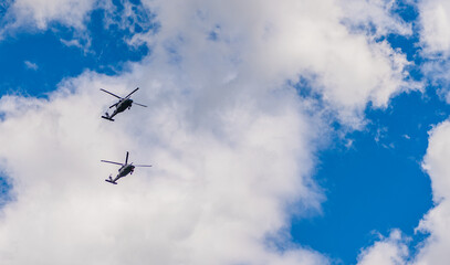 two helicopter rotorcraft. police helicopter. heli copter flight. helicopter transport. helicopter flying in the sky. copy space banner