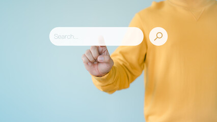 Information Technology SEO Search Engine Optimization. Search button on virtual screen pressed with finger for data and information. Using Search Console with your website. Web search concept.