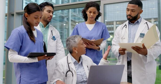 Angry, laptop and team of doctors in meeting with fail, crisis and discussion for problem in hospital. Healthcare, cardiology and men and women with upset boss for medical care, research and mistake