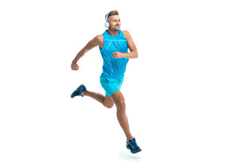sport jogger listen to music. The jogger ran at sport training isolated on white. In a morning sport workout jogger run in studio. The jogger stretched legs before running