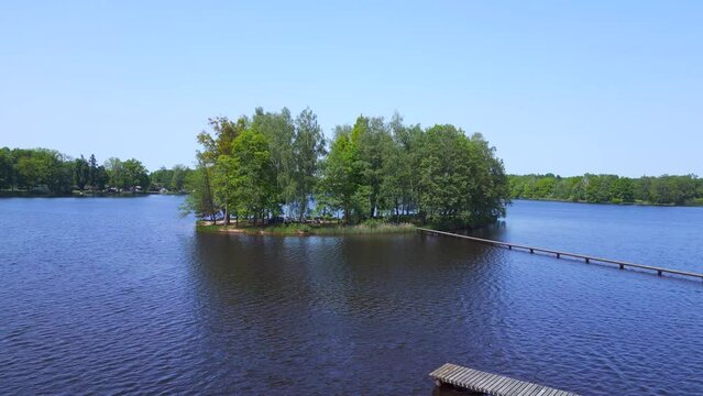 Nice aerial top view flight 
Natural Summer Paradise idyllic Island in Lake, Chlum in Czech, day 2023. fly reverse drone
4K Cinematic