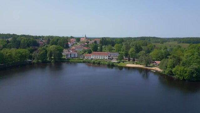 Spectacular aerial top view flight 
Vacation paradise village city Chlum at Lake Hejtman in Czech Summer day 2023. panorama overview drone
4K Cinematic