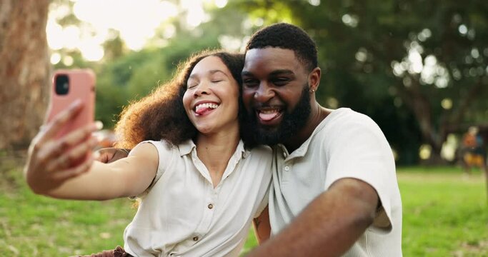 Funny, selfie and couple with phone in nature, park or outdoor together on holiday or date in summer with African people. Profile picture, man and happy woman with peace and love on social media