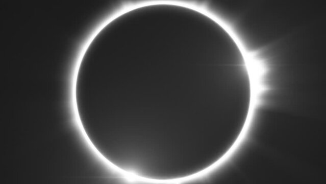 Total Solar Eclipse Ring of fire Halo in space. Black and white, Seamless Loop