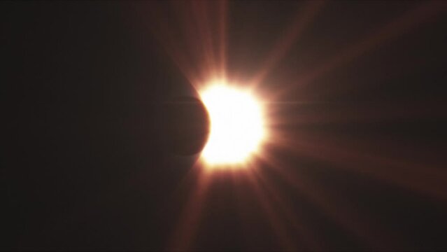 Rays of sun-light, moon covering the sun during Total Solar Eclipse.
