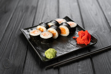 Maki rolls with salmon and cheese, top view. Sushi menu concept. Japanese food.