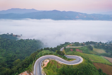 Fototapeta premium Beautiful road in the morning on countryside of Leoi province, Thailand.