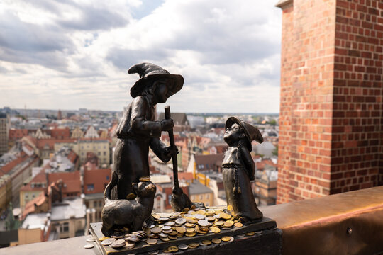 Wroclaw, Poland - May 2022 Dwarfs. Witches Tekla and Martynka Polish: Czarownice Tekla I Martynka on the observation deck of St. Mary Magdalenes Church. One of the most famous Wroclaw gnomes