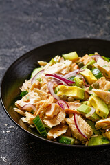 tuna salad with avocado, onion, cucumber, capers