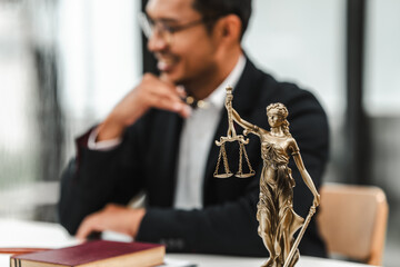 Handsome businessman lawyer of Indian descent. trusted litigation lawyers attorneys. most commonly...
