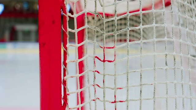 Soft dolly showing close up of ice hockey goal