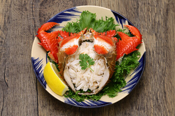 Boiled spanner crab ( red frog crab ). Crab meat is loosened and stuffed into the crab shell.